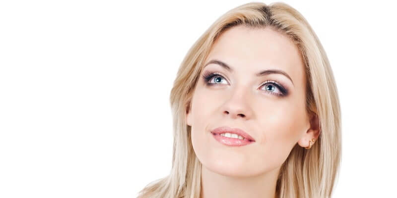 Close-up of a Russian woman's face highlighting common facial features like high cheekbones and a narrow nose