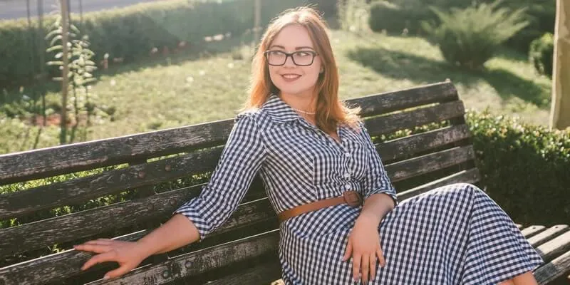 Russian woman wearing a dress reflecting Russian fashion trends
