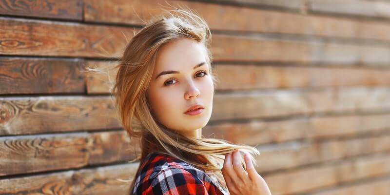 Blonde haired brown eyed Woman