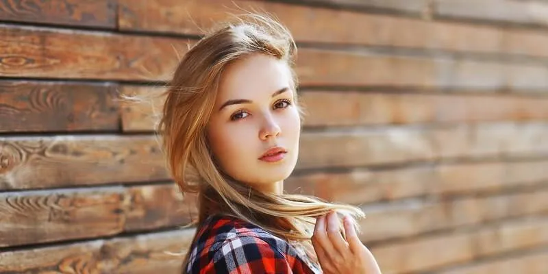 Blonde haired brown eyed Woman