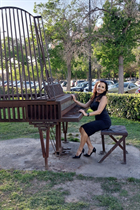 Mujer perfecta oksana de valencia con pelo Negro y edad 53 photo-10