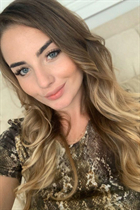 Ukrainian girl marina from ottawa with Light Brown hair age 28 photo-10
