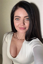 Jolie femme ukrainienne ekaterina de kyiv avec Noirs cheveux, âge 39 photo-1