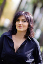 Girl in Ukraine olga from kharkov with Dark Brown hair age 52 photo-1