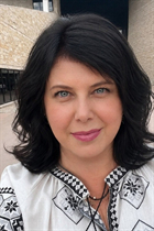 Girl from winnipeg iryna with Dark Brown hair age 55 photo-1