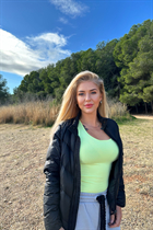 valencia bride oksana with Blonde hair age 54