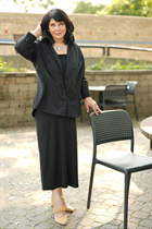 Girl from winnipeg iryna with Dark Brown hair age 55 photo-11