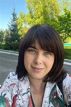 Girl from winnipeg iryna with Dark Brown hair age 55 photo-27