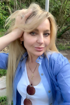 Bride from vienna olena with Blonde hair age 50 photo-17