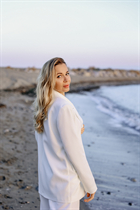 milan bride natalia with Blonde hair age 44 photo-16