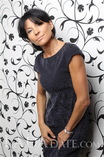 Pretty girl natalia from saint-petersburg with Dark Brown hair age 56