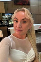 Single Ukrainian lady tetiana from poltava with Blonde hair age 40