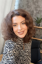 Single Ukrainian lady yuliana from kyiv with Dark Brown hair age 46 photo-2