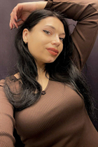 Beautiful woman of Ukraine alina from dubno with Dark Brown hair age 33 photo-1