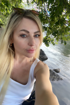 Bride from vienna olena with Blonde hair age 50 photo-14