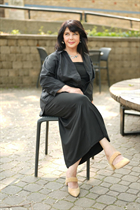 Girl from winnipeg iryna with Dark Brown hair age 55 photo-9