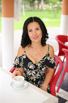 Ukranian mail order bride irina from kharkov with Black hair age 47