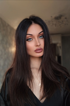 Ukrainian girl adelina from odessa with Dark Brown hair age 28 photo-7