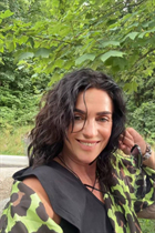 Dating a ukrainian woman lyubov from rivne with Dark Brown hair age 63 photo-3