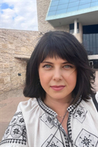 Girl from winnipeg iryna with Dark Brown hair age 55 photo-20