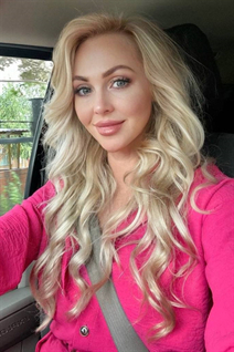 Fille de valència olga aux cheveux Blond, age 43