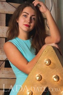 Russian mail order bride catalog ruslana from zaporozhye with Dark Brown hair age 22